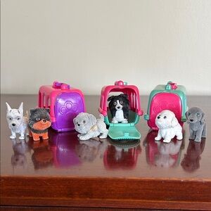 Puppy in My Pocket, group of 3 pet carriers and 6 puppies from Just Play 2015.